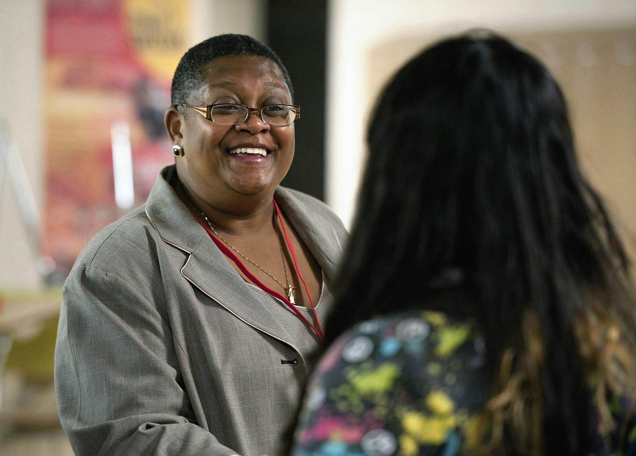 Minneapolis School Superintendent Bernadeia Johnson stopped for a visit to Minneapolis South High School on the first day of classes and greeted a new student who was finding her way around the school. ] GLEN STUBBE * gstubbe@startribune.com ORG XMIT: MIN2012082817591354 ORG XMIT: MIN1308211150405115