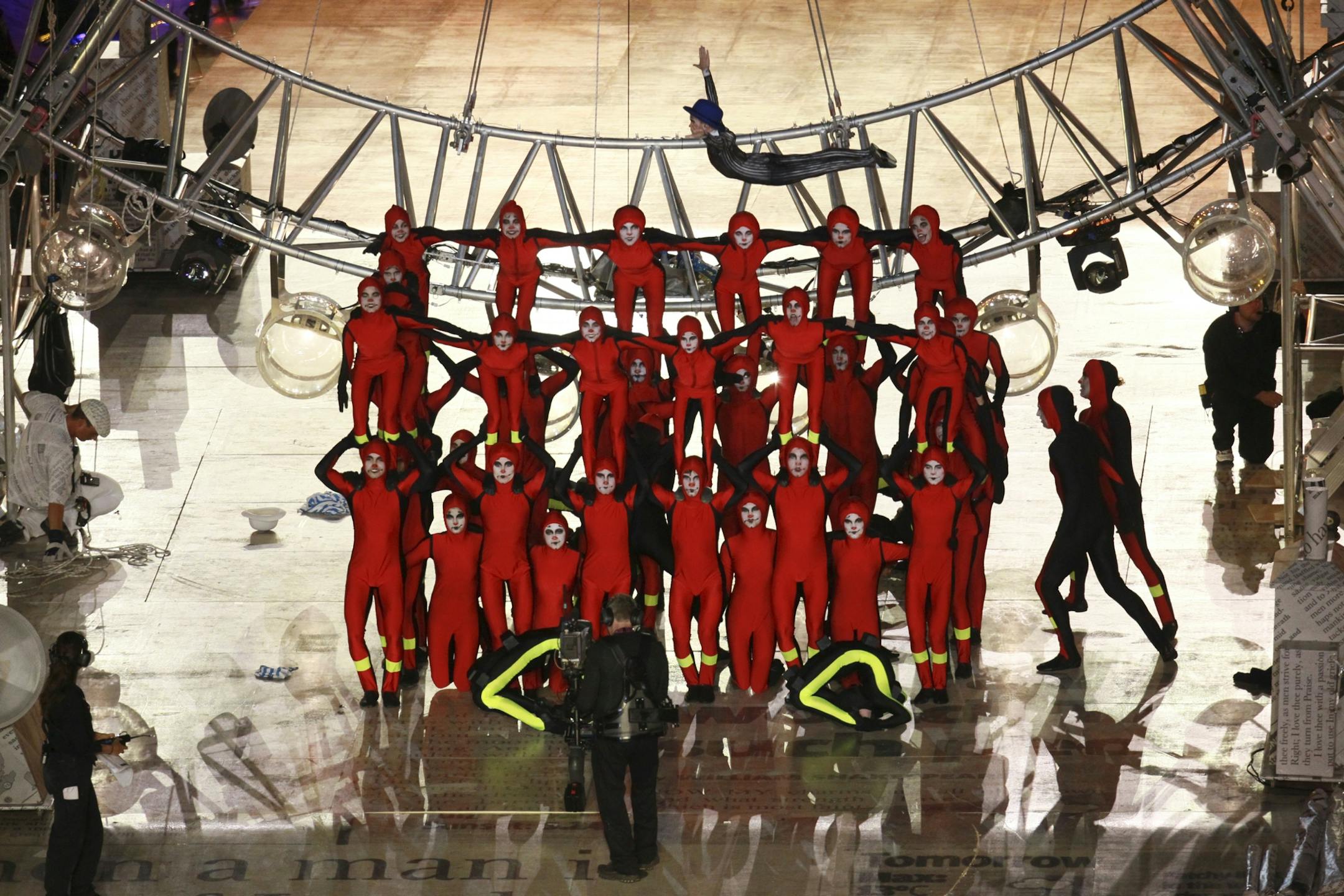 The gymnast troupe Spelbound wearing red and black