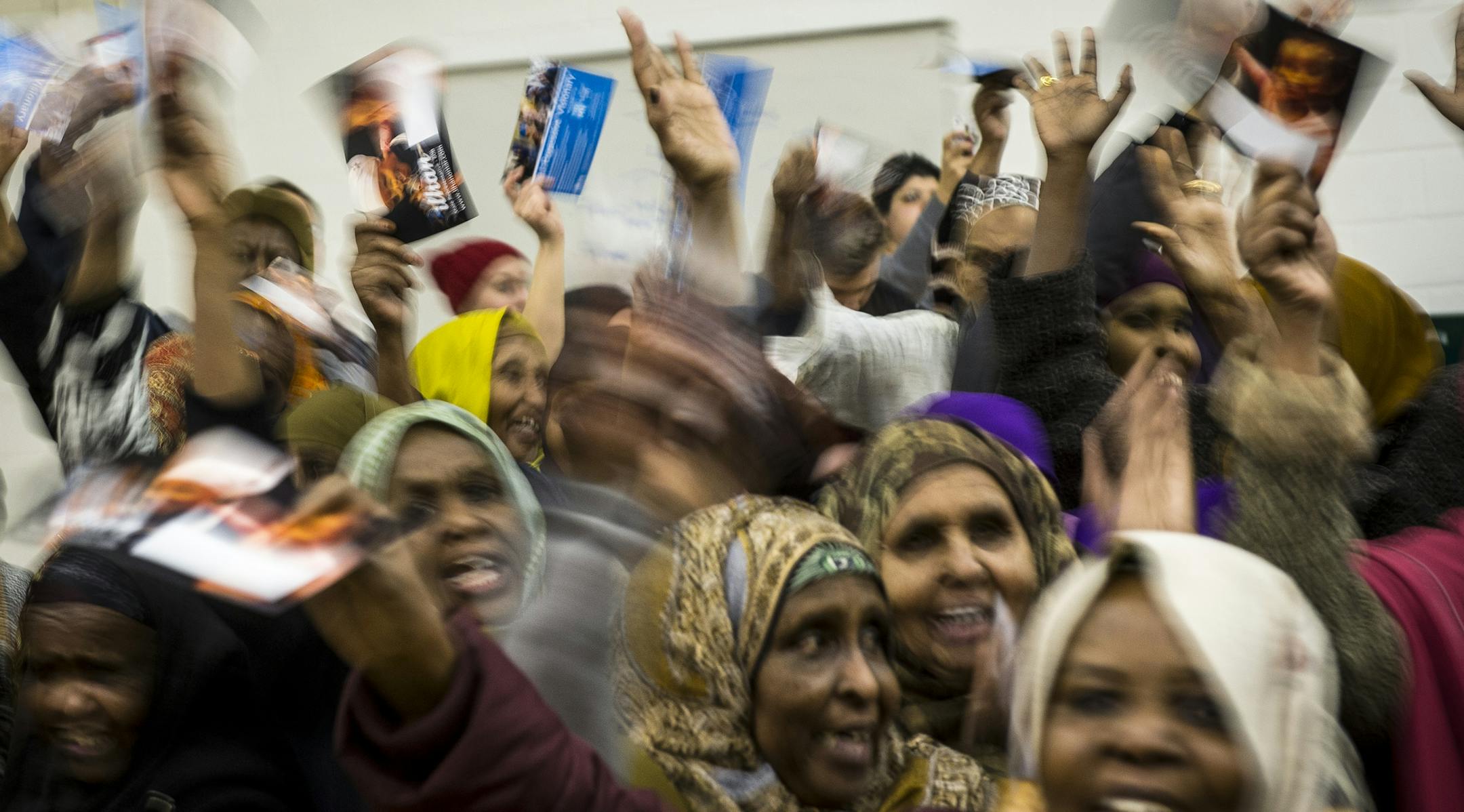Supporters cheered before District 60B State Representative Candidate Ilhan Omar addressed the caucus Tuesday night at the Brian Coyle Center in Minneapolis. ] (AARON LAVINSKY/STAR TRIBUNE) aaron.lavinsky@startribune.com Thousands of Minnesotans will go to their caucus sites Tuesday night to make their pick for president. Minnesota could be a pivotal state for victorious candidates from both parties. We photograph the caucus at the Brian Coyle Center in Minneapolis, Minn. on Tuesday, March 1, 20