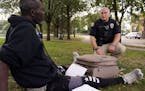 Officer Justin Tiffany checked the well being of a man sleeping in a park.