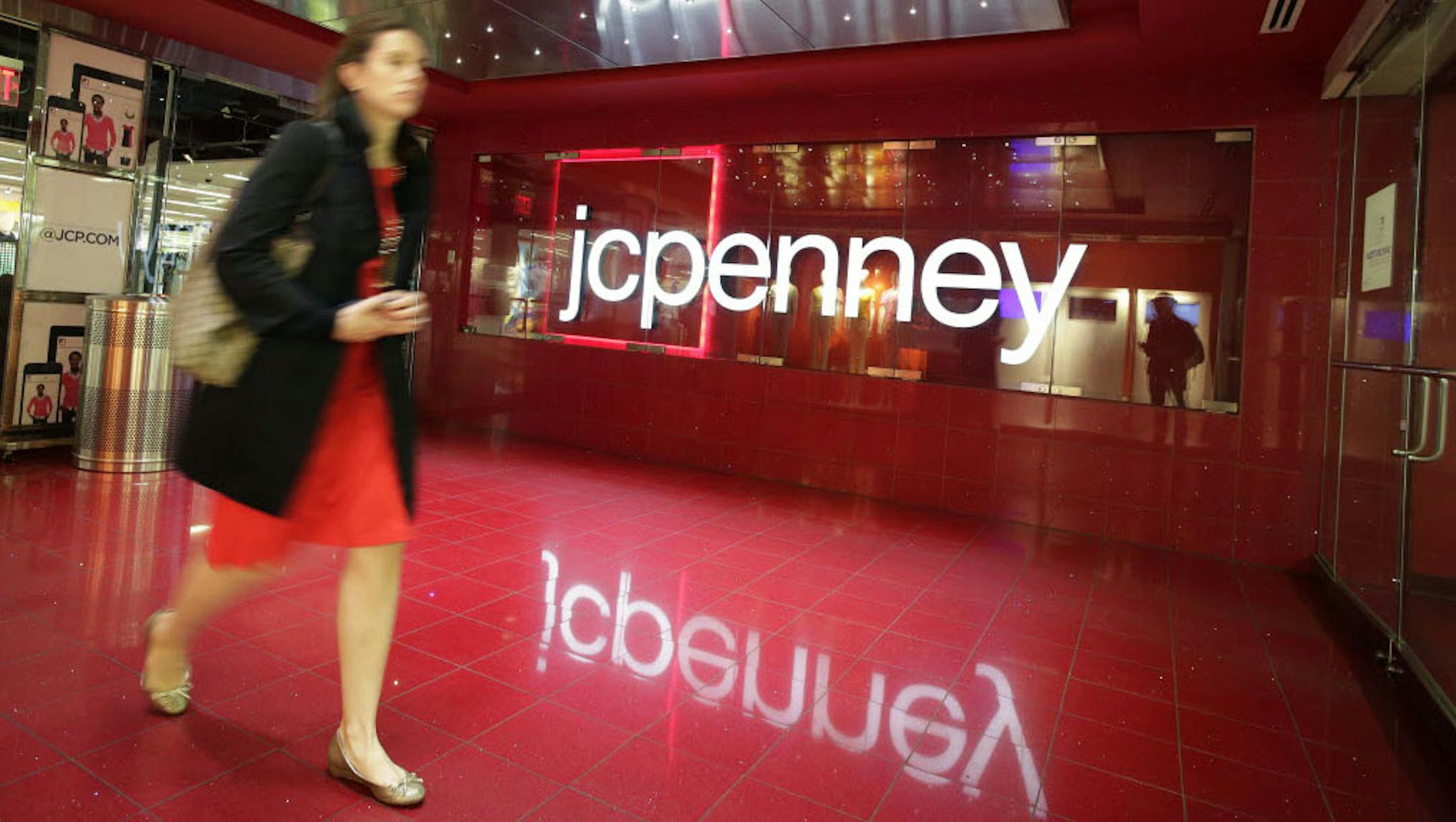A customer leaves a J.C. Penney store in New York.