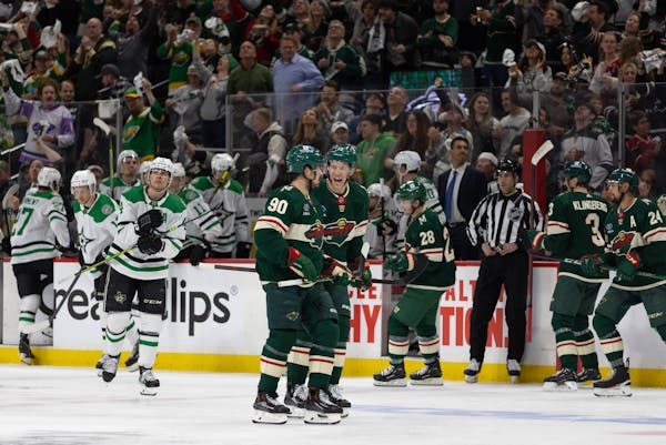 Minnesota Wild left wing Marcus Johansson (90) and Minnesota Wild left wing Matt Boldy (12) celebrated after Johansson scored in the second period. Th