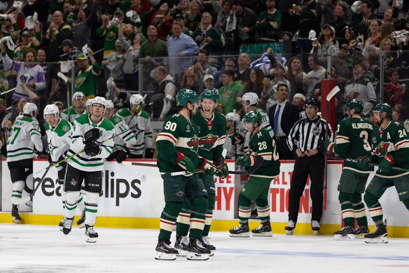 Minnesota Wild left wing Marcus Johansson (90) and Minnesota Wild left wing Matt Boldy (12) celebrated after Johansson scored in the second period. The Minnesota Wild faced the Dallas Stars in Game 3 of an NHL hockey Stanley Cup first-round playoff series, Friday night, April 21, 2023 at Xcel Energy Center in St. Paul. ] CARLOS GONZALEZ • carlos.gonzalez@startribune.com