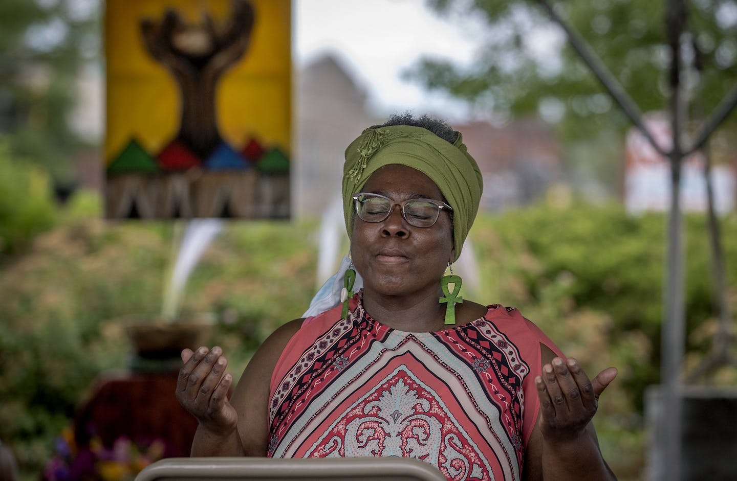 Jean Loyd prayed for 8 minutes and 45 seconds during a quiet time of prayer at the 30 Days of Prayer: Healing the Heart of Our City, in a parking lot, Tuesday, July 7, 2020 in Minneapolis, MN. The 30 Days of Prayer: Healing the Heart of Our City, is an African American-led collaborative designed to inject a spiritual component to the policy debates following the death of George Floyd. The folks praying inside are interrupted by a chime at exactly 8 minutes, 45 seconds -- the amount of time a Min