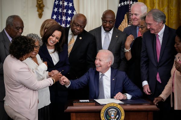 President Joe Biden signed the Juneteenth National Independence Day Act into law in the East Room of the White House on June 17, 2021, in Washington, 