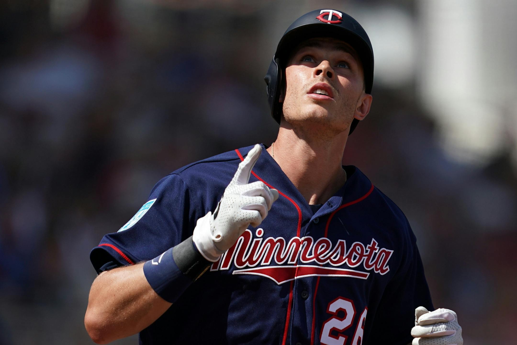 Minnesota Twins right fielder Max Kepler (26) pointed to the sky after he hit a second home run in his second at bat during Sunday's game.