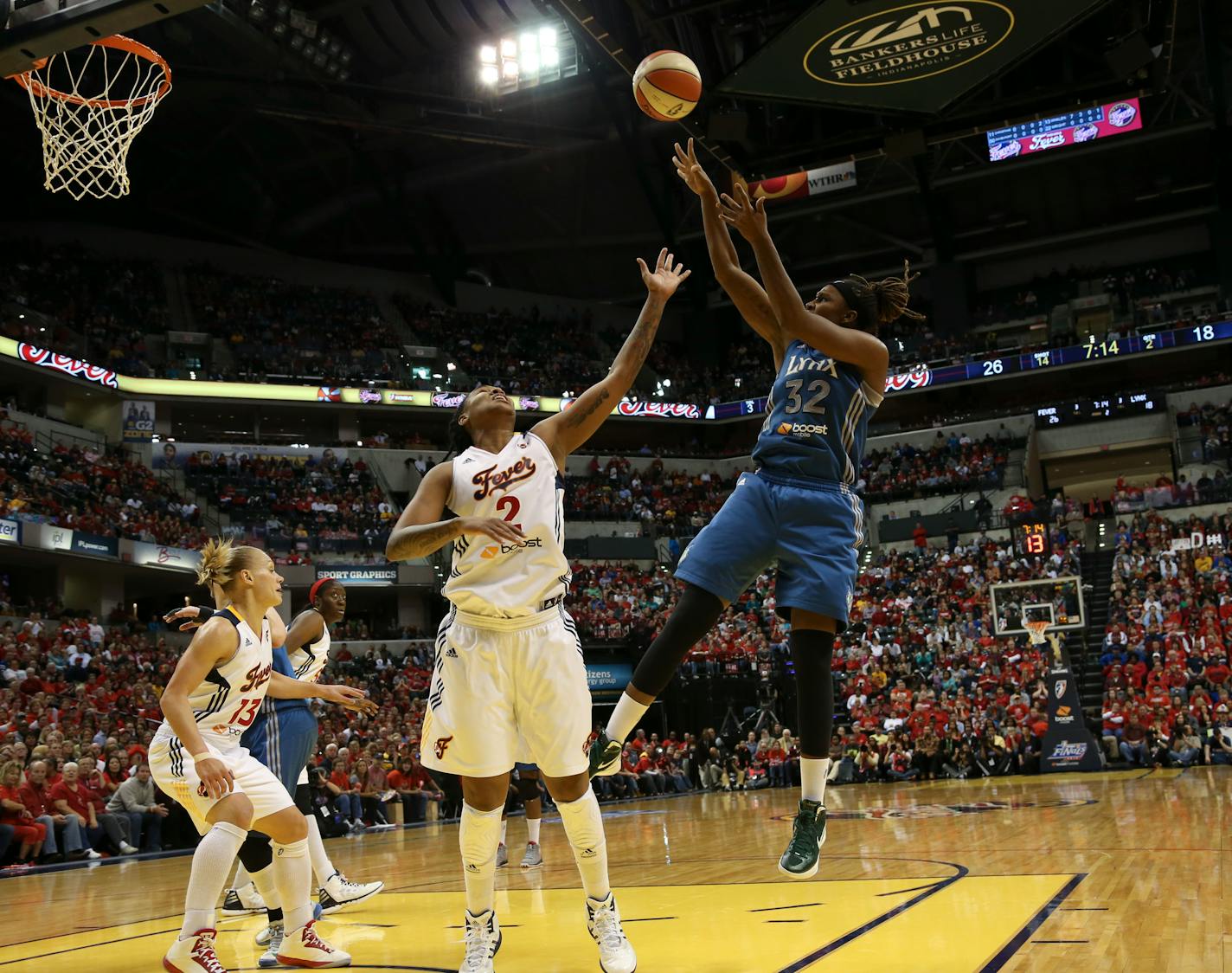 Rebekkah Brunson goes for the shot against Indiana's Erlana Larkins during Gme 3 of the WNBA Finals in 2012.