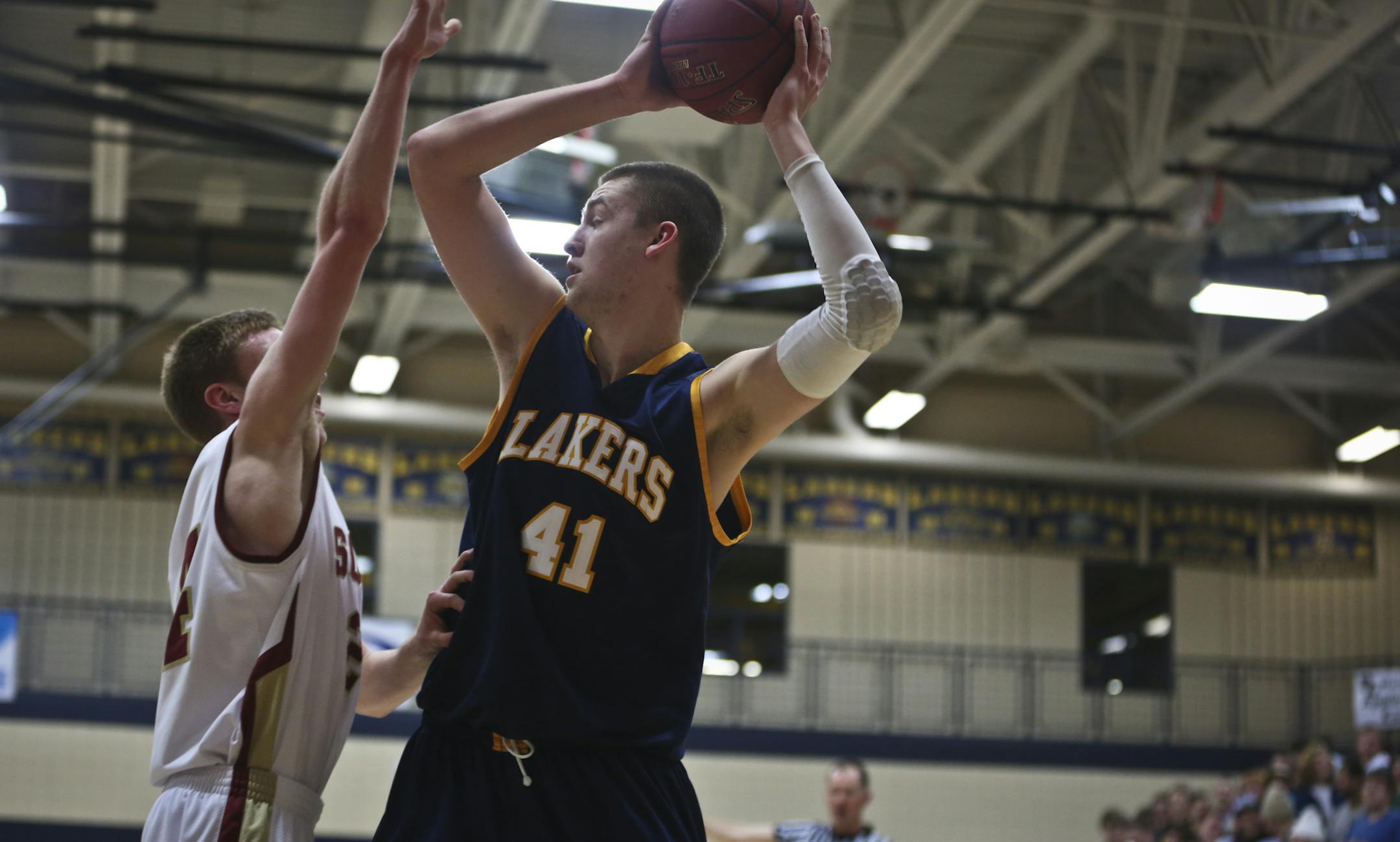 Prior Lake's seven foot center Carson Shanks looked for a shot during a game against Lakeville South on Wednesday, March 6, 2013, at Prior lake High School in Savage, Minn. ] (RENEE JONES SCHNEIDER * reneejones@startribune.com)