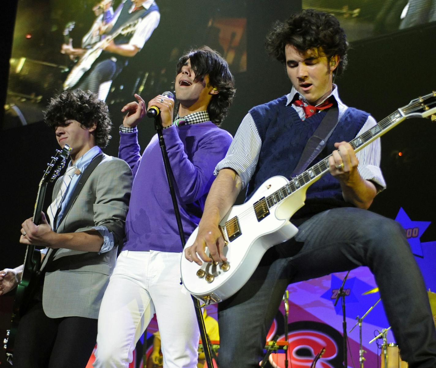 The Jonas Brothers, Nick, left, Joe, and Kevin, right, perform during Z100's Zootopia '08 concert Saturday night, May 17, 2008 at Izod Center in East Rutherford, N.J.