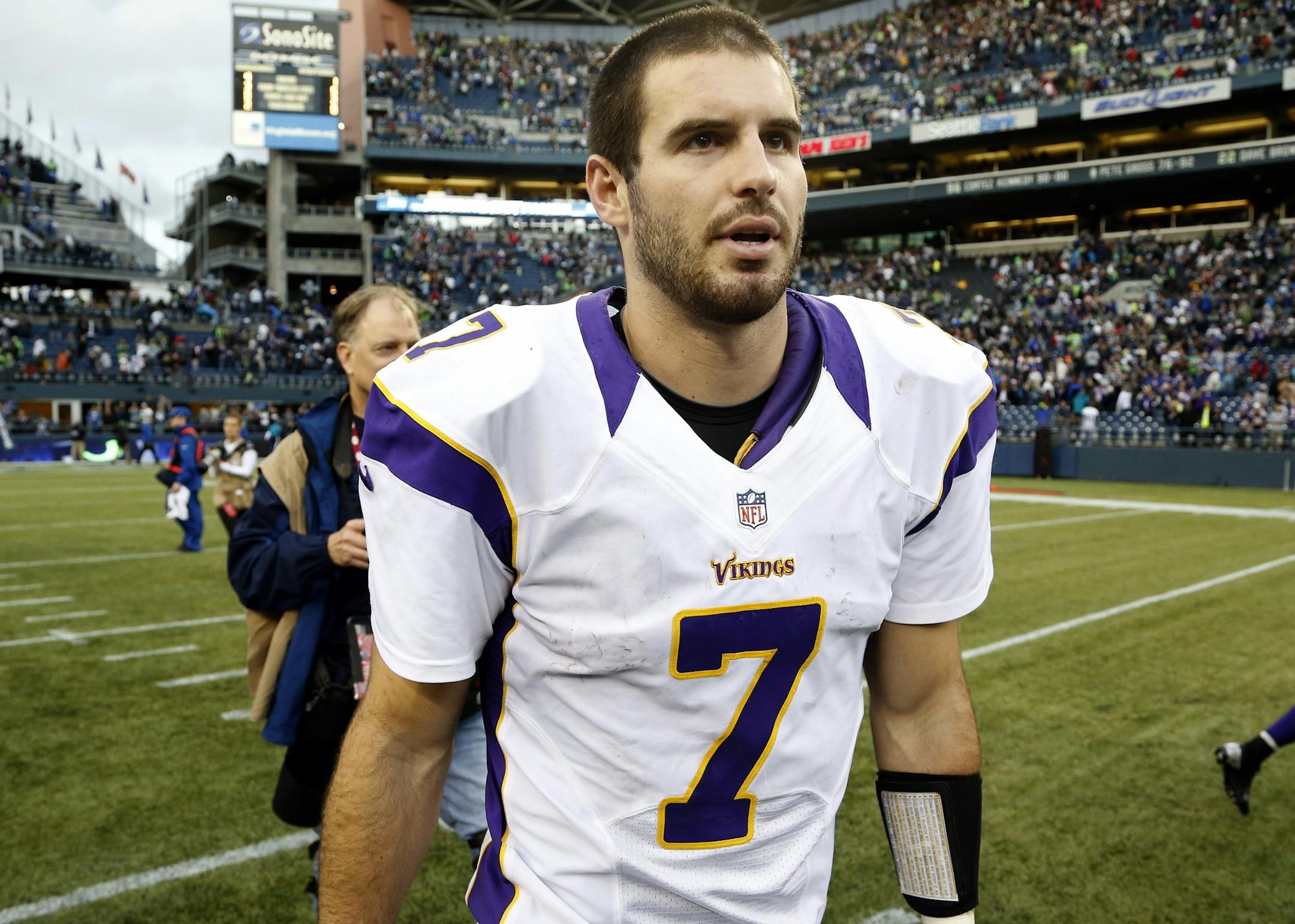 Vikings quarterback Christian Ponder (7) walked off the field at the end of the game. Seattle beat Minnesota by a final score of 30-20.