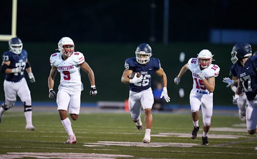 St. Thomas Academy running back Savion Hart (26) runs down the field during the first half of a football game between Robbinsdale Armstrong at St. Thomas Academy in Mendota Heights, Minn. on Friday, Sept. 29, 2023. ] LEILA NAVIDI • leila.navidi@startribune.com