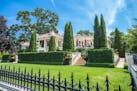 This Mediterranean villa is one of the most recognizable houses on Lake of the Isles Parkway.