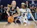 UConn guard Paige Bueckers was pressed in Sunday’s championship game by South Carolina guard Destanni Henderson.