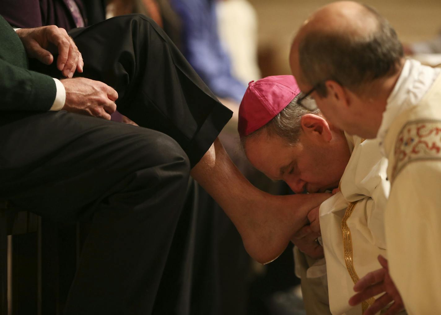 The Most Rev. Bernard Hebda kissed the feet of Paul Putzier after he washed and dried them Thursday night during the Evening Mass of the Lord's Supper at the Cathedral of St. Paul. ] JEFF WHEELER &#xef; jeff.wheeler@startribune.com The Most Rev. Bernard Hebda was named Archbishop of the Archdiocese of St. Paul and Minneapolis by Pope Francis Thursday. Thursday evening, March 23, 2016 he presided over the Maundy Thursday mass at the Cathedral of St. Paul, during which he performed the traditional