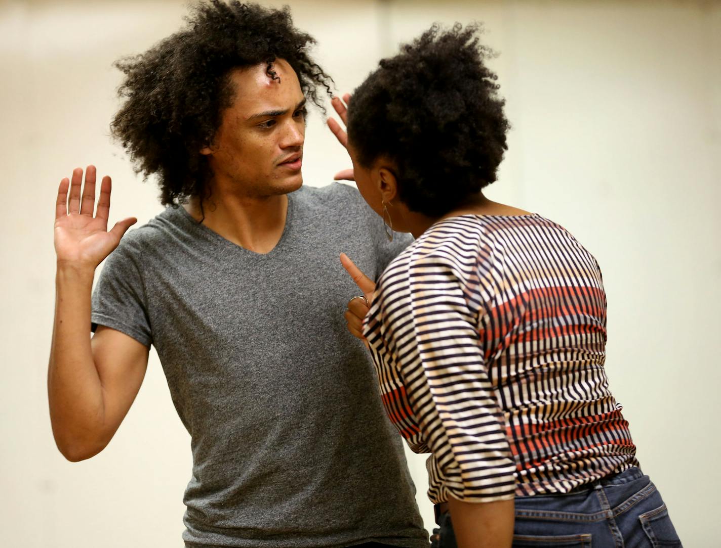 Lauren Daivs playing Osha asked if he was gay to Nathan Barlow playing Marcus Eshu during rehearsal ] (KYNDELL HARKNESS/STAR TRIBUNE) kyndell.harkness@startribune.com Dress rehearsal for the final play in Tarell McCraney's Brother/Sister trilogy. "Marcus, or the Secret of Sweet" at the Pillsbury HouseTheater in Minneapolis Min., Friday, August, 5, 2014.