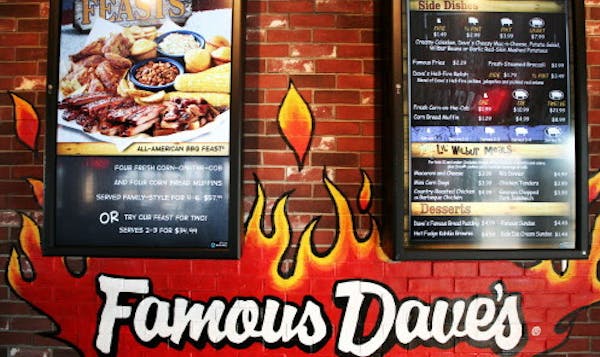 A menu board at a Famous Dave's location.