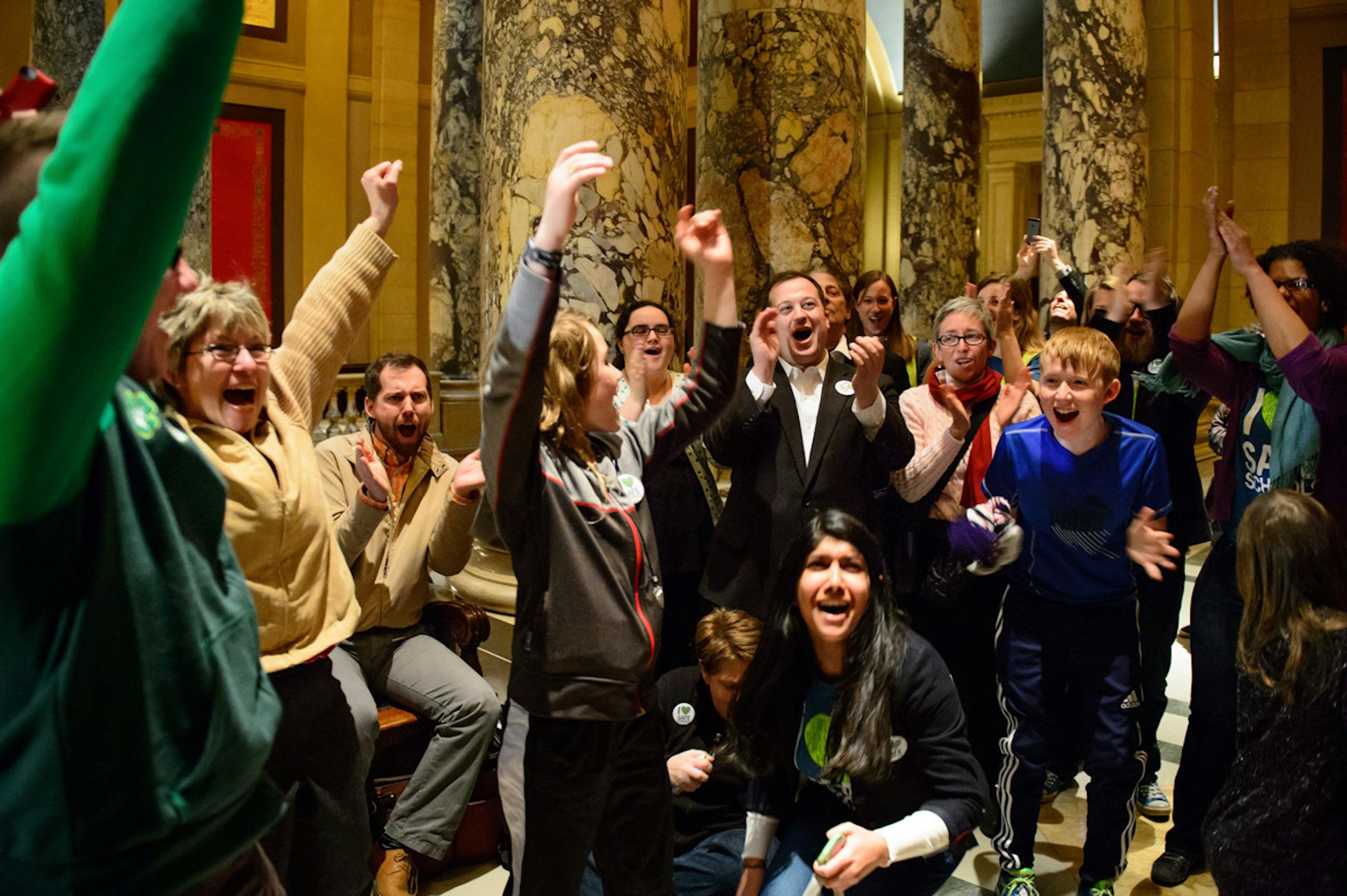 Members of Outfront Minnesota held their breath and prayed as the vote was taken on the anti-bullying bill and cheered as it passed 36-31. ] GLEN STUBBE * gstubbe@startribune.com Thursday, April 3, 2014.