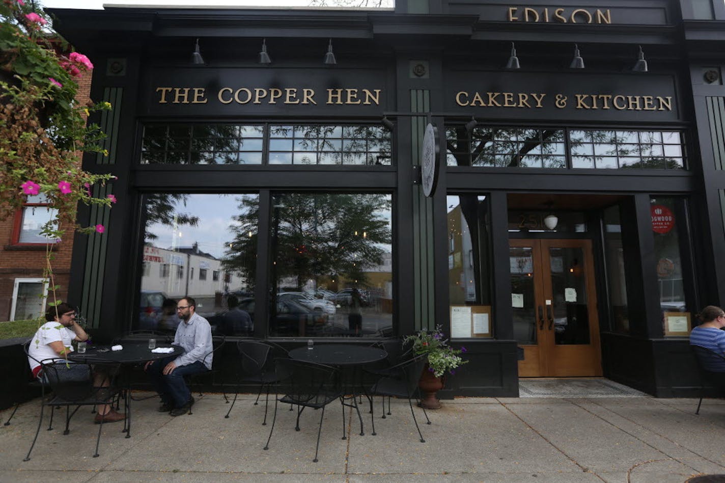 Patrons eat outside Copper Hen, located in a building that was transformed in 2013.