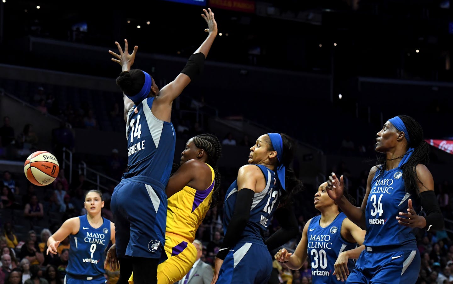 Sparks guard Chelsea Gray lost control of the ball against the Lynx in the first half of Tuesday night's WNBA playoff game. Los Angeles defeated the Lynx, ending their season.