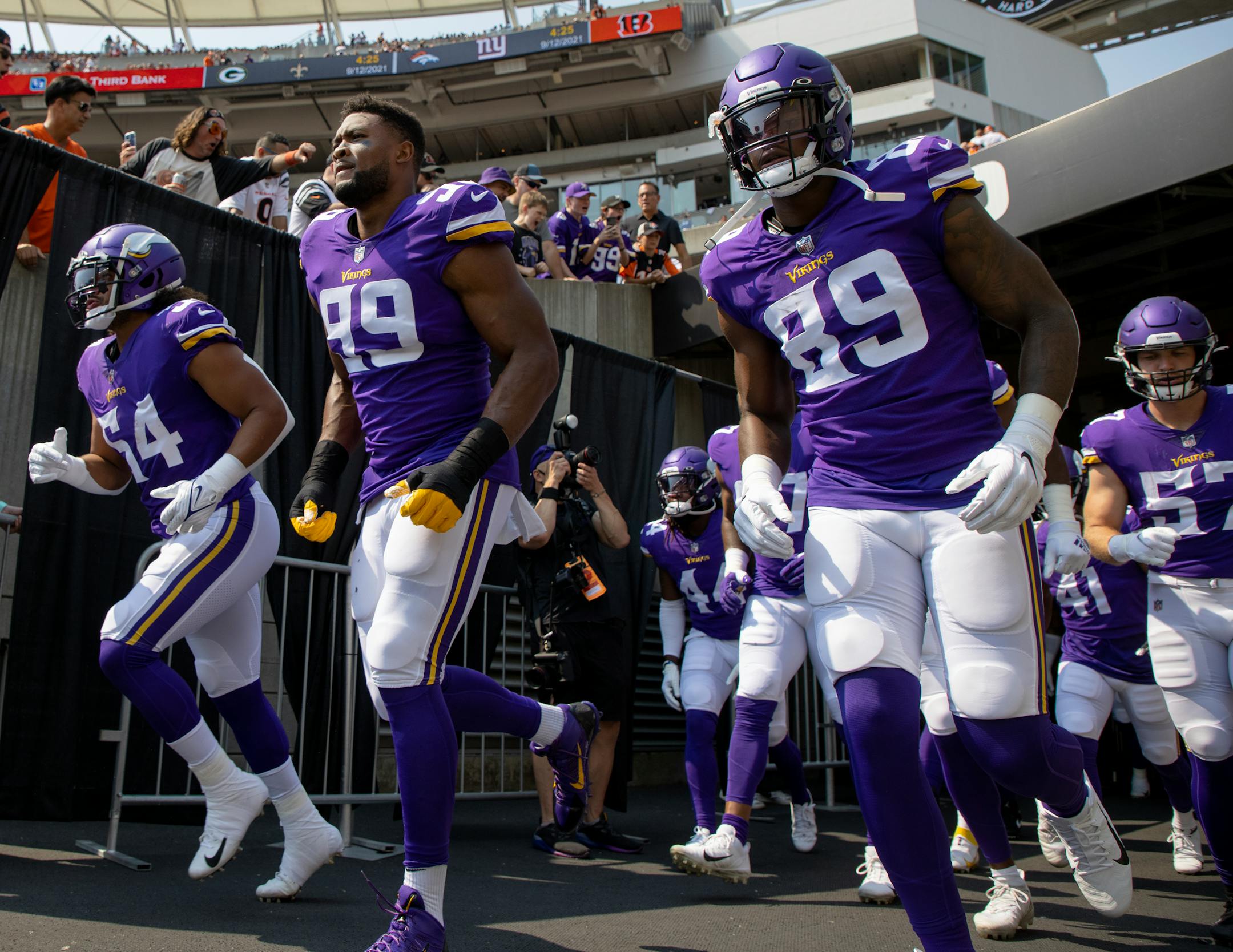 The Minnesota Vikings ran onto the field for the start of the game at Paul Brown Stadium.