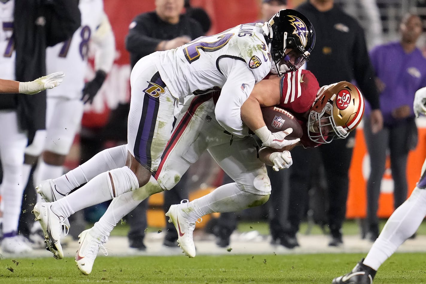 Baltimore Ravens safety Marcus Williams, top, tackles San Francisco 49ers running back Christian McCaffrey during the second half of an NFL football game in Santa Clara, Calif., Monday, Dec. 25, 2023. (AP Photo/Godofredo A. Vásquez)