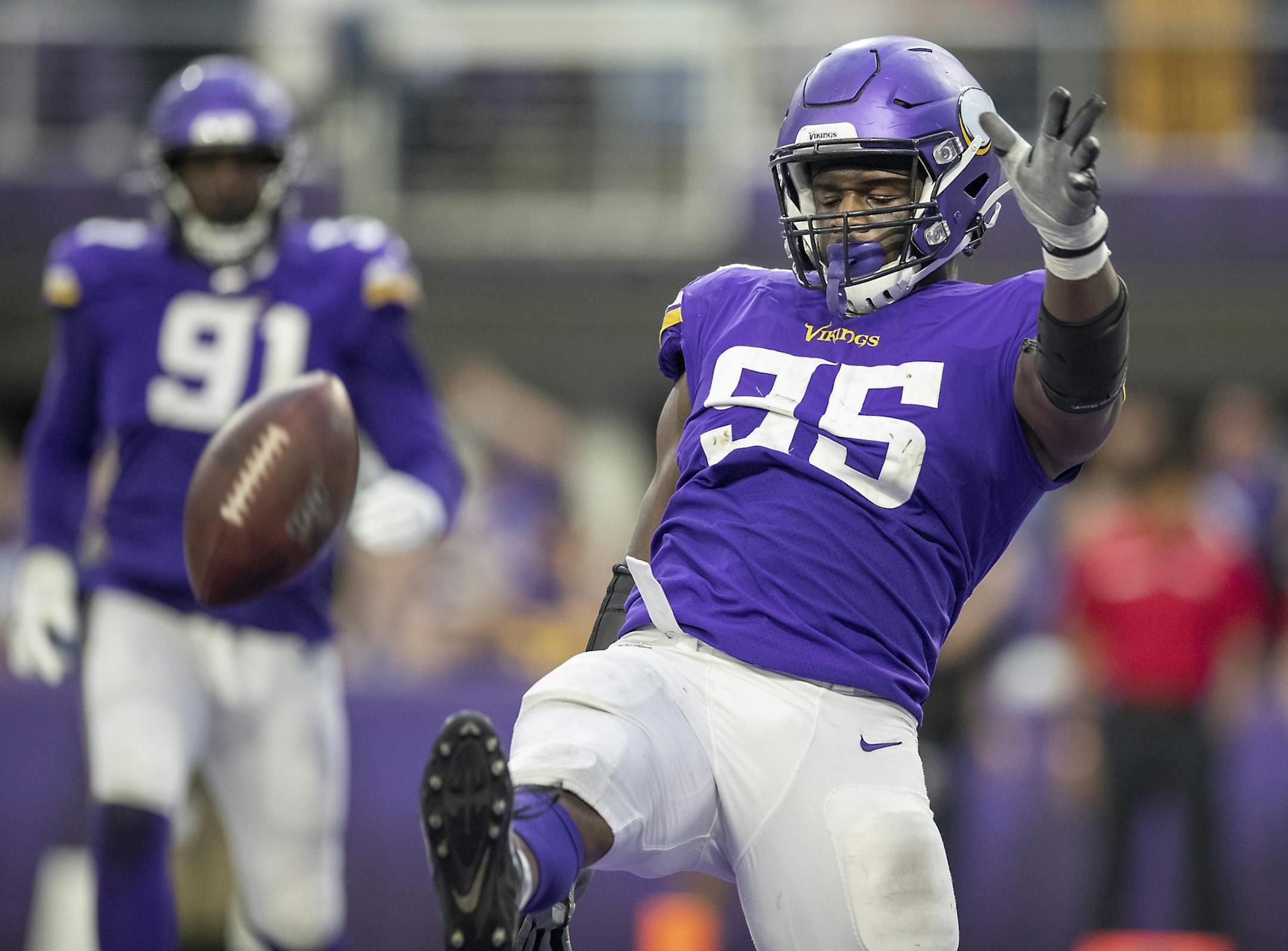 Minnesota Vikings defensive end Ifeadi Odenigbo kicked the ball after recovering the ball from Chicago in the fourth quarter.
