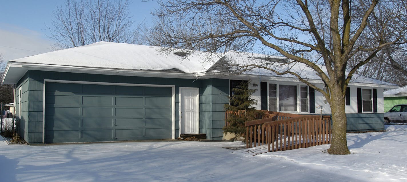 The garage on this home, while probably not original to the structure, blends in well with the character of the home, according to Clayton Larson, chief building official for Coon Rapids, The home still has cedar shake siding. GENERAL INFORMATION: DARLENE PROIS &#xd4; dprois@startribune.com COON RAPIDS, MN. 1/18/2006: The city of Coon Rapids is working with Anoka-Ramsey Community College's Midwest Preservation Institute to teach residents how to maintain the historic character of their 1950's vi