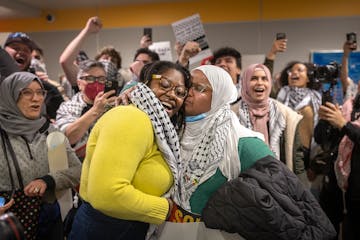 Minneapolis Council member Robin Wonsley was hugged after the City Council voted on a “Passage of Resolution supporting a permanent ceasefire and pr