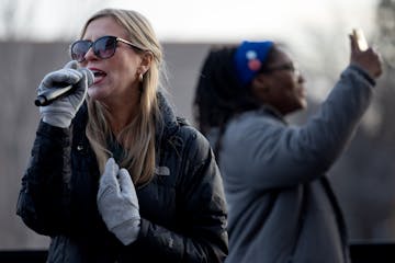 Greta Callahan, left, led a union rally recently outside Minneapolis Public Schools headquarters. On Tuesday, she announced she will run for a seat on