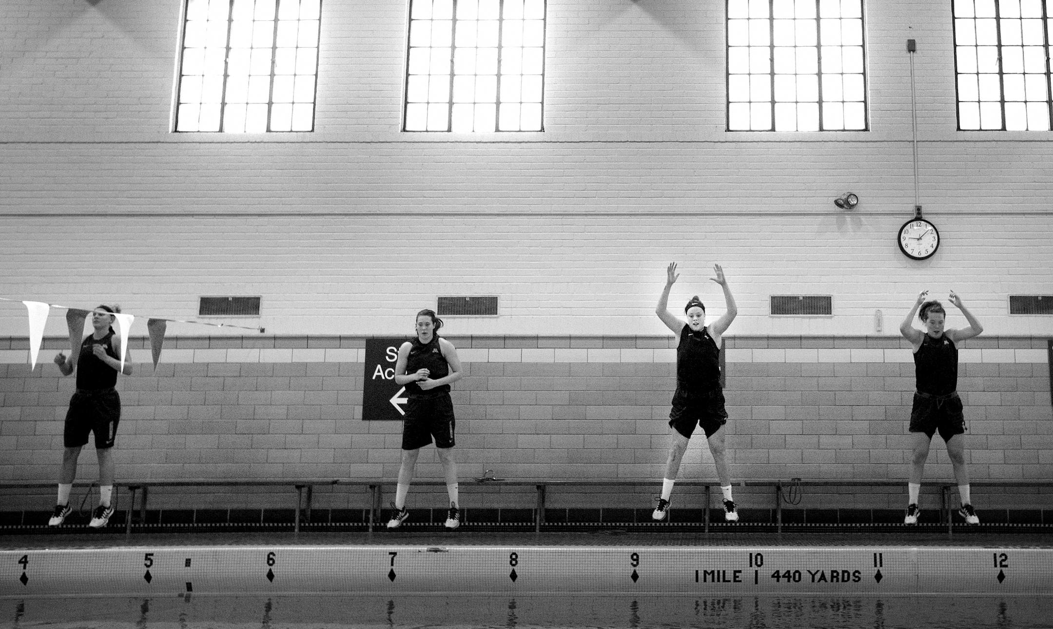 Rachel Banham with teammates during a pool workout session on July 10, 2015 at University Aquatic Center.