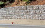 A gabion wall for Wabasha Street would be a retaining wall made of rocks held together by wire mesh.