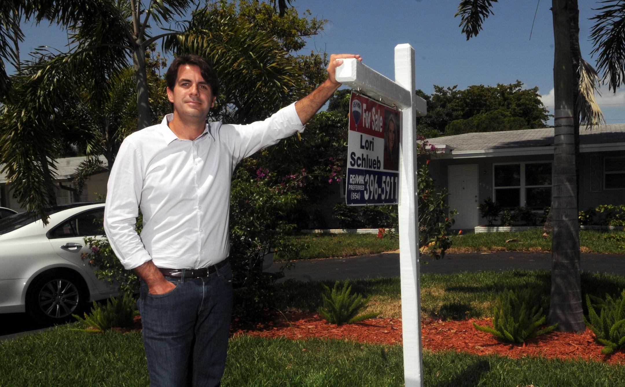 Bruno Duarte stands in front of a house he is flipping in Oakland Park, Florida, on May 9, 2013. Flippers often improve the homes they purchase, boosting the price, but also the local housing market. "When I put a house back up for sale, it usually goes very quickly," said the 34-year-old former stock broker. (Taimy Alvarez/Sun Sentinel/MCT) ORG XMIT: 1138726 ORG XMIT: MIN1305152310160828