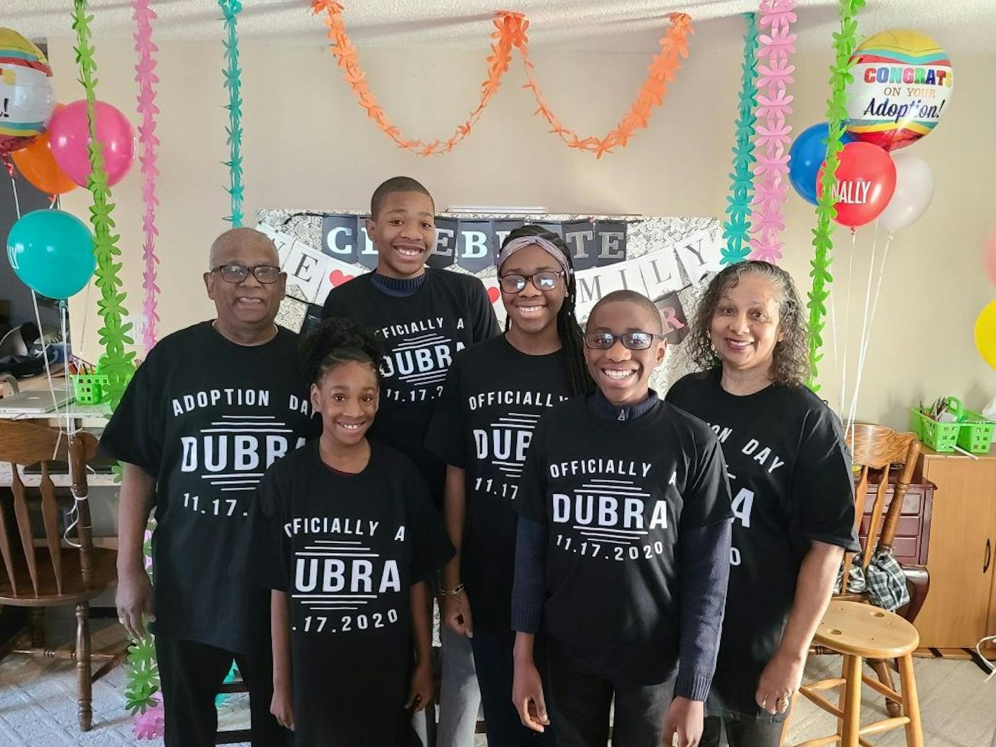 The newly expanded Dubra family of Brooklyn Park celebrated last week as the judge finalized four adoptions. Photo courtesy of the Dubra family ORG XMIT: C0kraU10RGJJxUJLyqkz