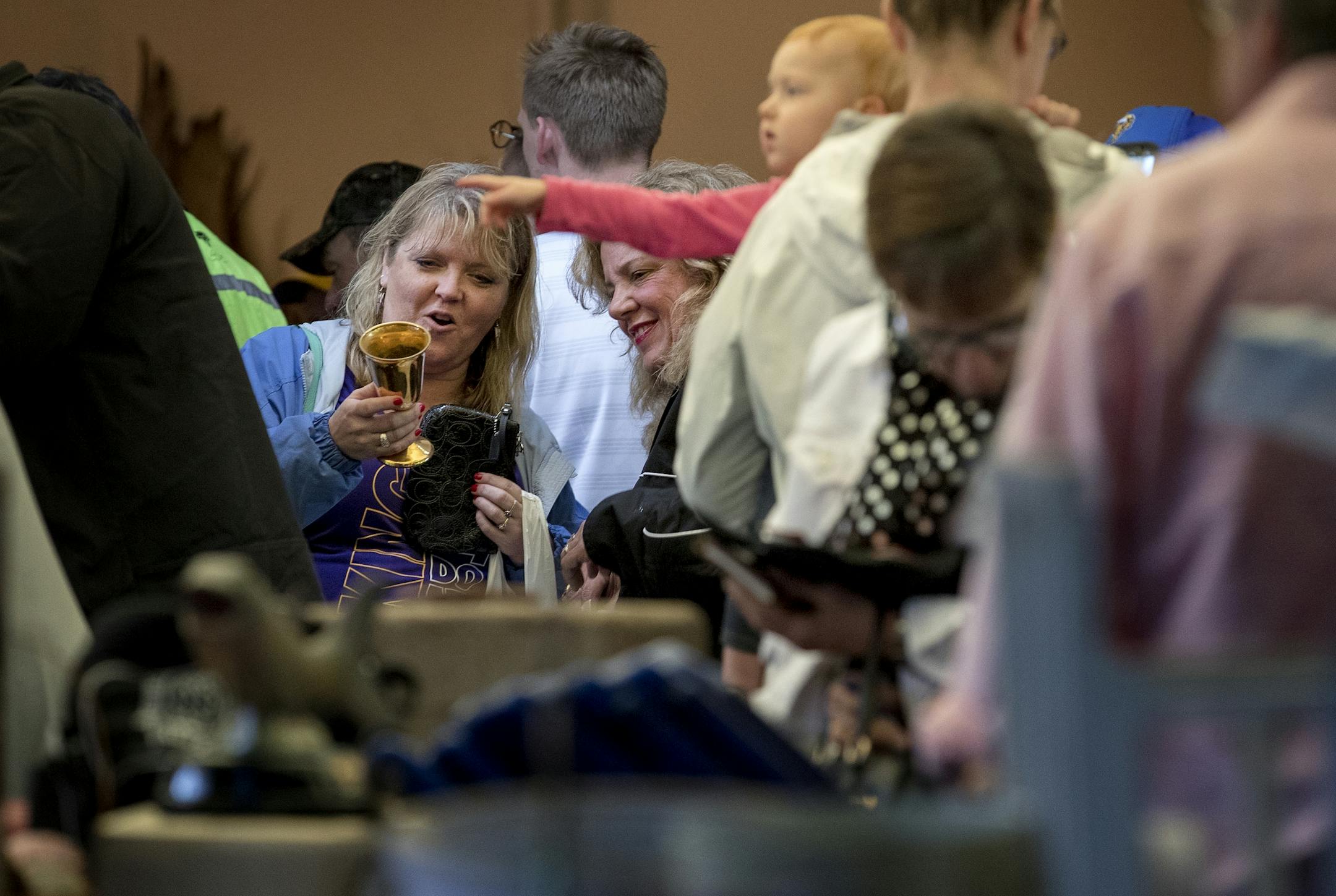 Shoppers at the Bud Grant annual garage sale. The former Minnesota Vikings head coach turns 90 years old on May 20.