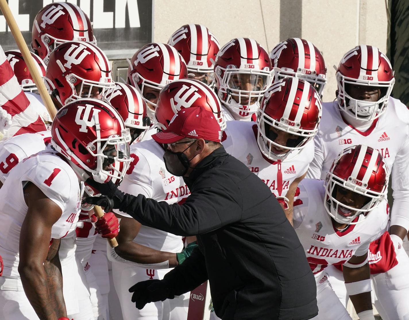 Indiana head coach Tom Allen fires ups his team before the first half of an NCAA college football game against Michigan State, Saturday, Nov. 14, 2020, in East Lansing, Mich. (AP Photo/Carlos Osorio) ORG XMIT: otkco118