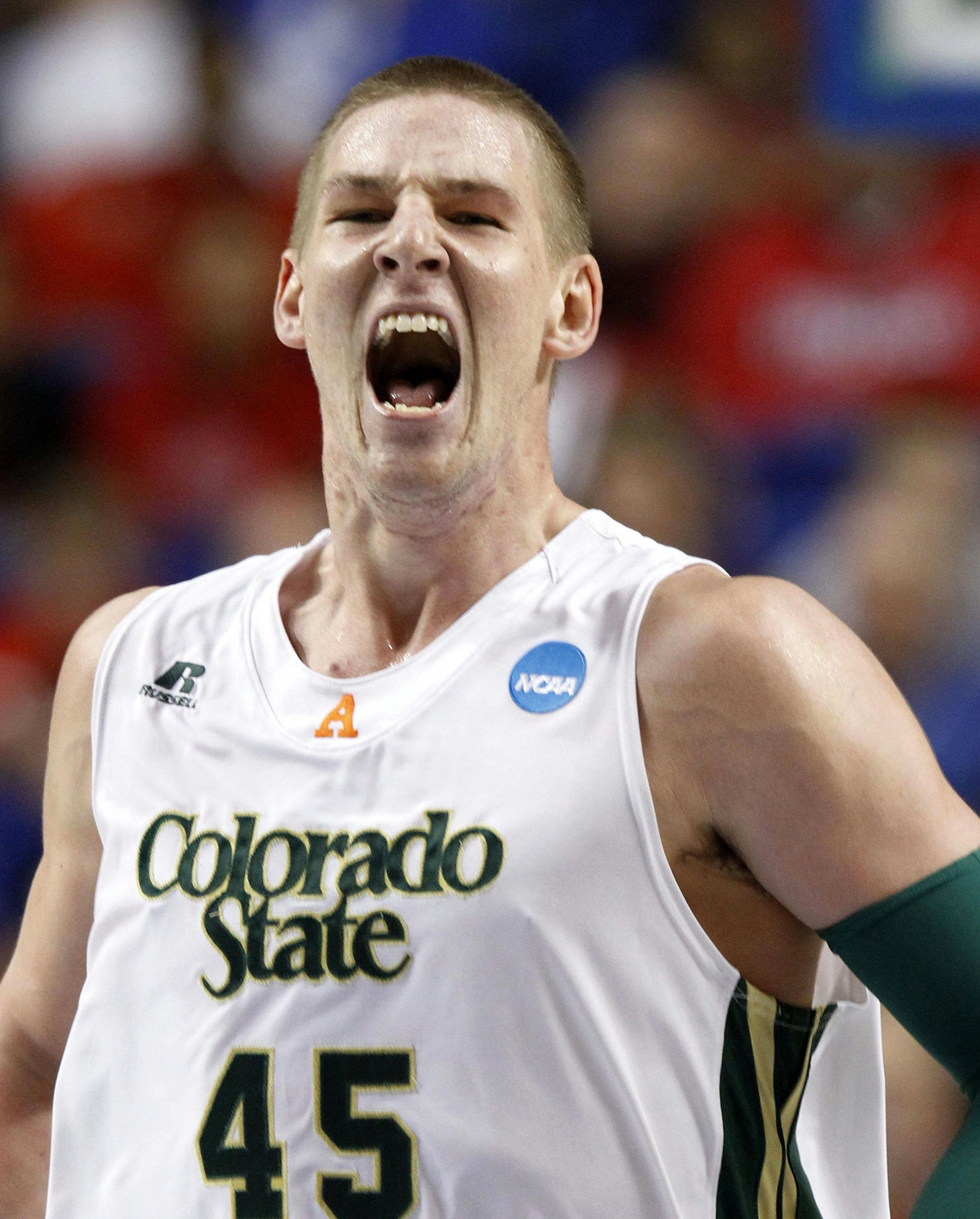 Colorado State's Colton Iverson (45) reacts after a basket during the first half of their second-round NCAA college basketball tournament game against Missouri, Thursday, March 21, 2013, in Lexington, Ky. (AP Photo/James Crisp) ORG XMIT: KYJB145