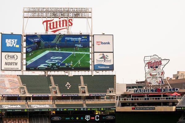The Vikings vs. Packers game was shown on the giant screen in left field at Target Field before the Twins game began.