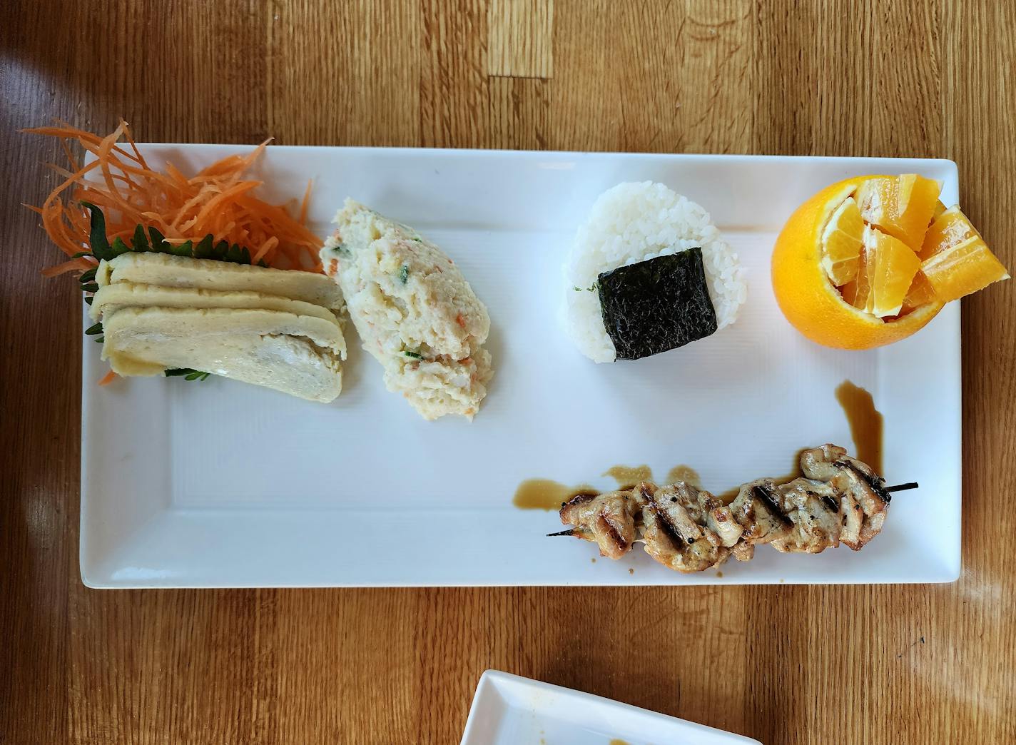 The kids combo at Kyatchi in Minneapolis comes with onigiri, tamago and Japanese potato salad.