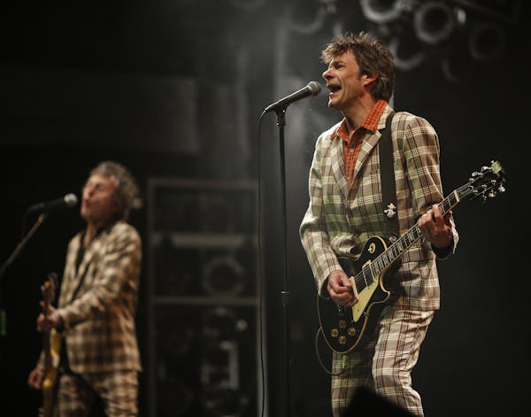 Tommy Stinson, left, and Paul Westerberg of The Replacements during their set at Midway Stadium Saturday evening. ] JEFF WHEELER &#x201a;&#xc4;&#xa2; 