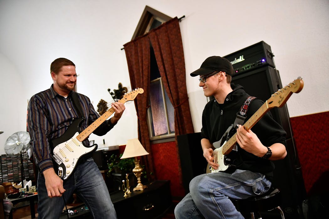 John LaDue jammed with his guitar teacher, Ryan Lano, at Lano's studio, a repurposed church in Minnesota Lake, about a 45-minute drive from Waseca.