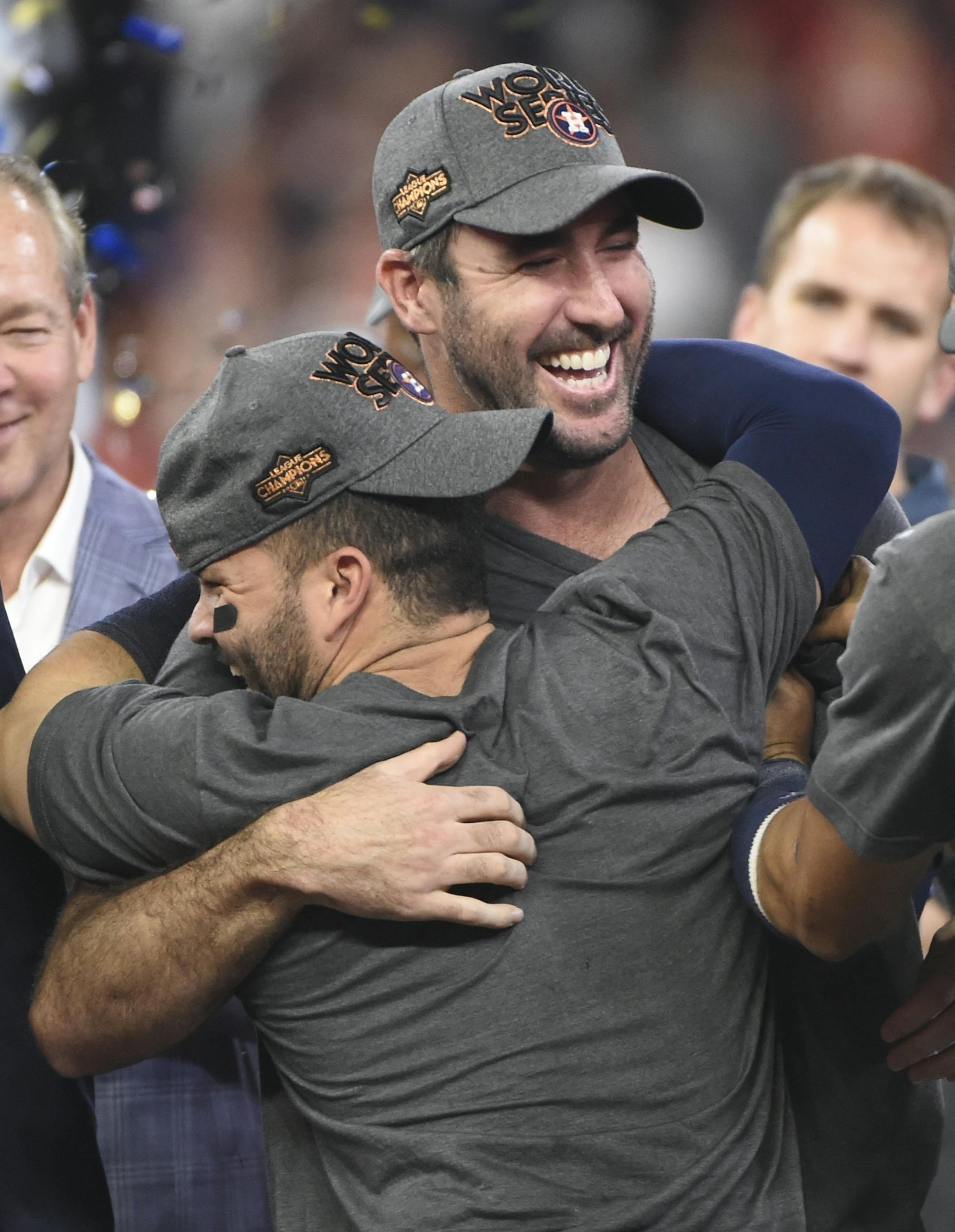Houston Astros' Justin Verlander hugs Jose Altuve after Game 7 of baseball's American League Championship Series against the New York Yankees Saturday, Oct. 21, 2017, in Houston. The Astros won 4-0 to win the series. (AP Photo/Eric Christian Smith)