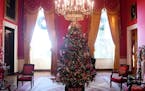 Christmas trees and holiday decorations are seen in the Red Room of the White House in Washington, DC, November 27, 2017.(Olivier Douliery/Abaca Press