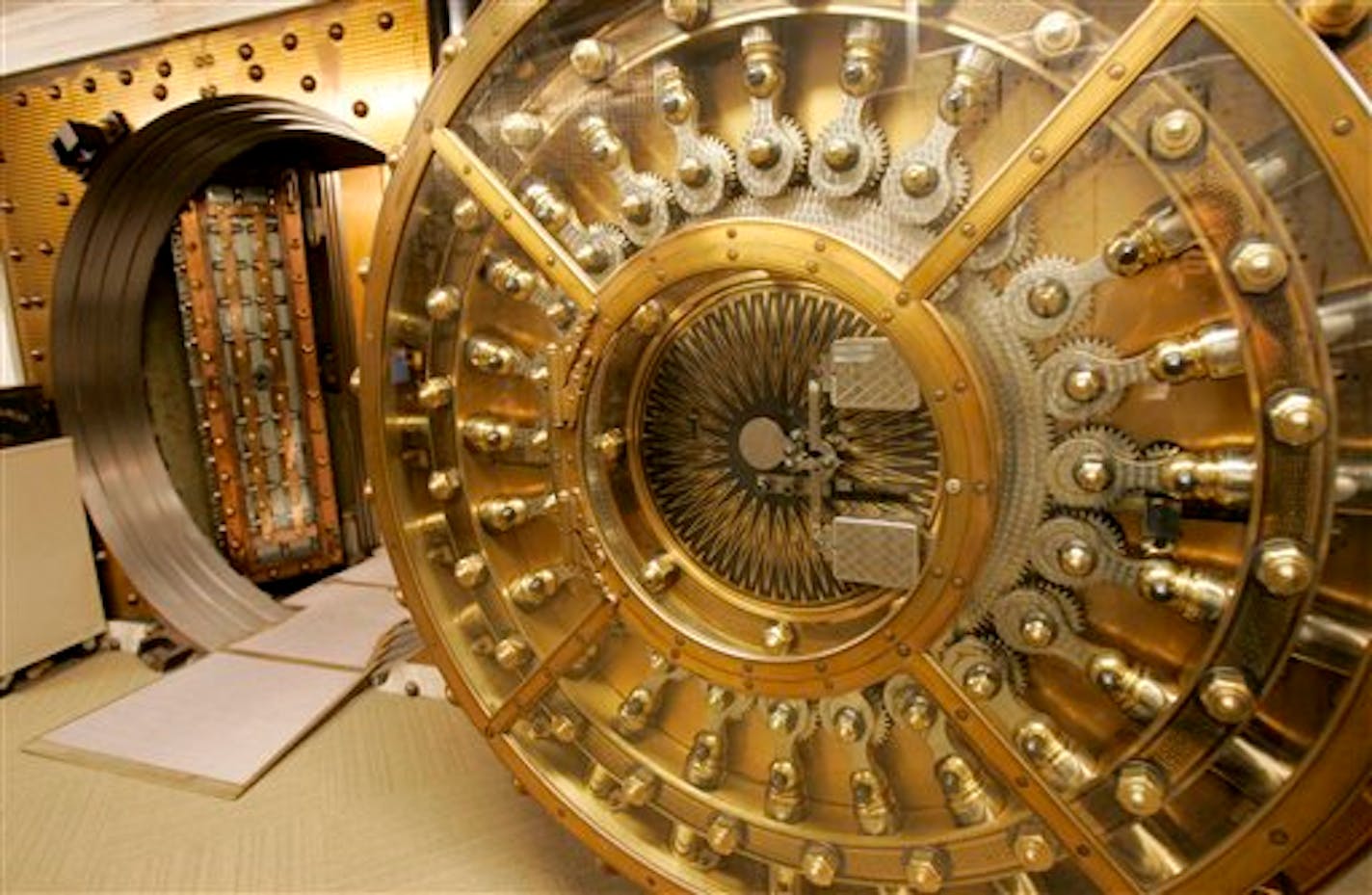 The door to the bank vault at a Wells Fargo bank is shown after a news conference announcing the Wells Fargo vSafe, a personal online safe, in San Francisco, Wednesday, Oct. 1, 2008. (AP Photo/Jeff Chiu)