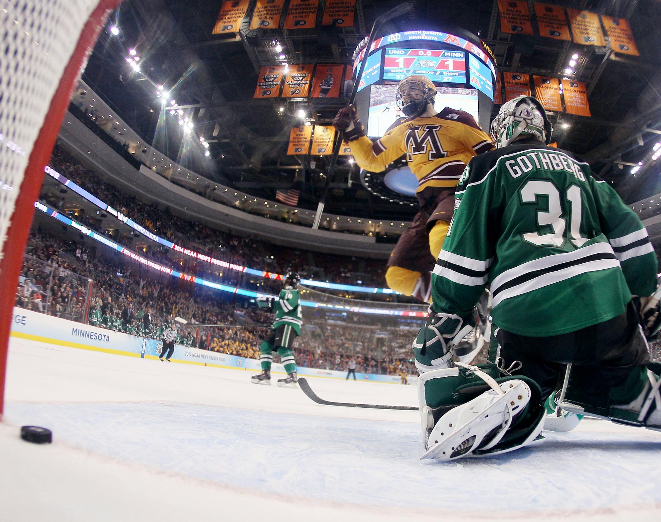 Seth Ambroz of the Gophers celebrated teammate Justin Holl&#x2019;s shorthanded goal with six-tenths of second left. It got past North Dakota goaltender Zane Gothberg.