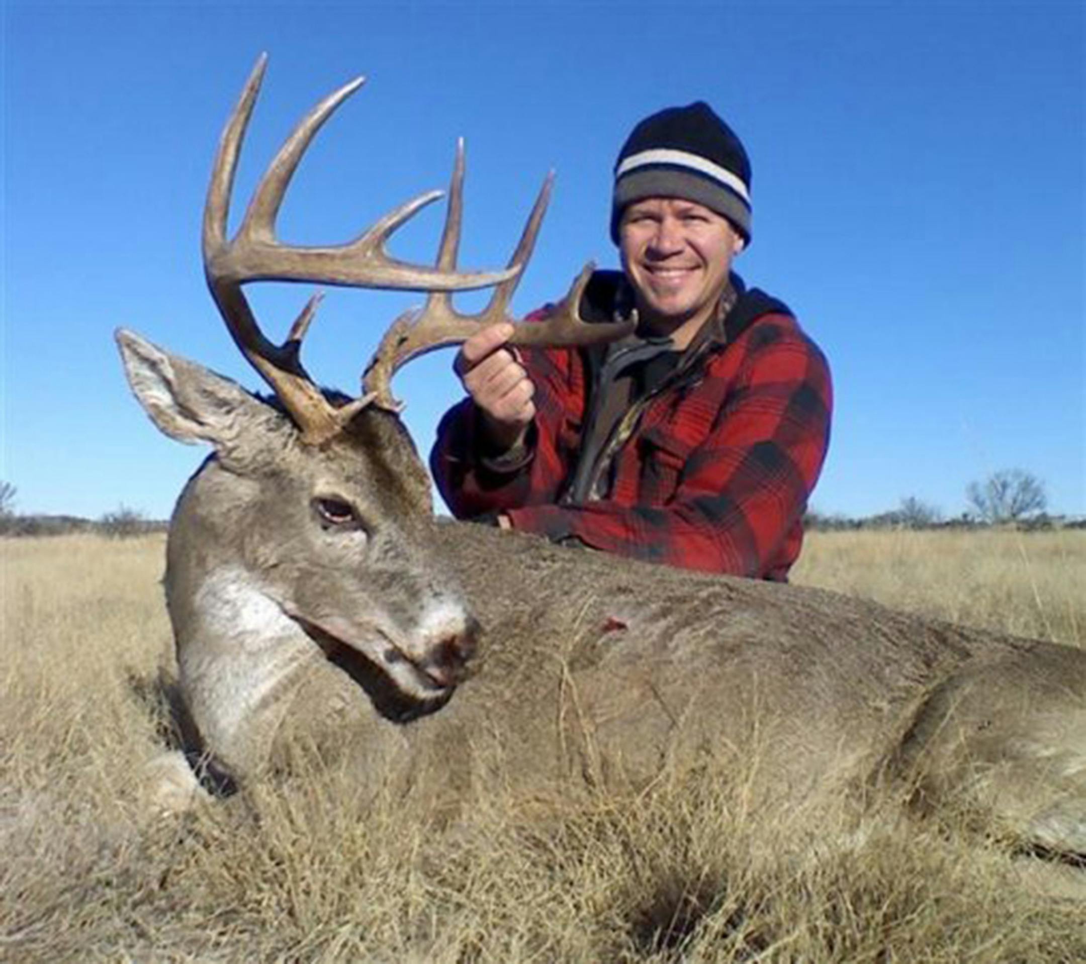 Brooks Johnson of Monticello, president of Minnesota Bowhunters Inc., with a big buck he shot in Texas. Photo courtsey Brooks Johnson.
