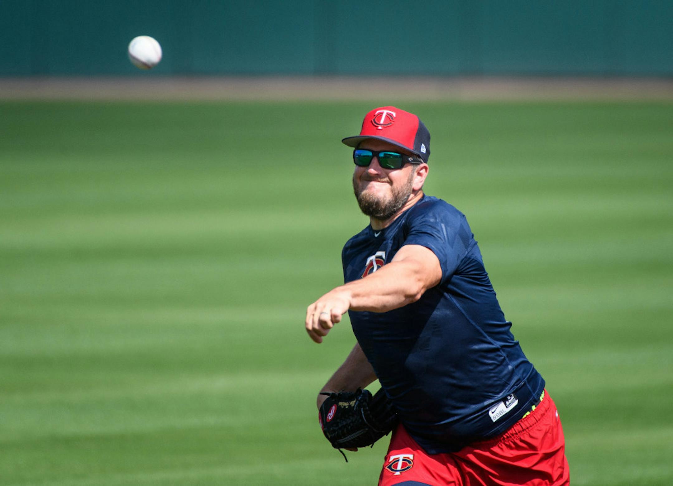 Glen Perkins threw the ball during spring training.