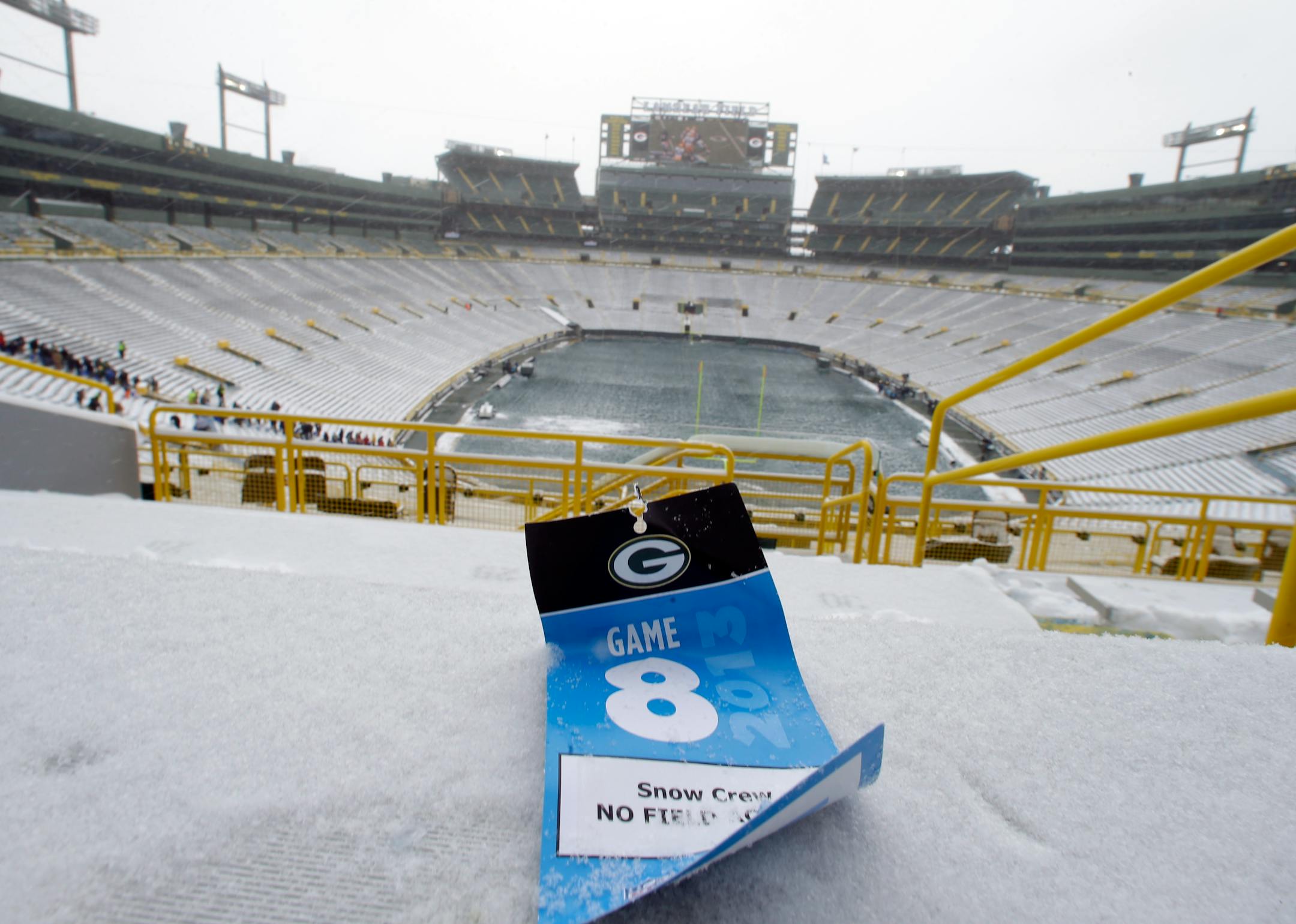 A snow crew credential is seen in the seating area of Lambeau Field before an NFL football game between the Green Bay Packers and the Pittsburgh Steelers Sunday, Dec. 22, 2013, in Green Bay, Wis. (AP Photo/Jeffrey Phelps)