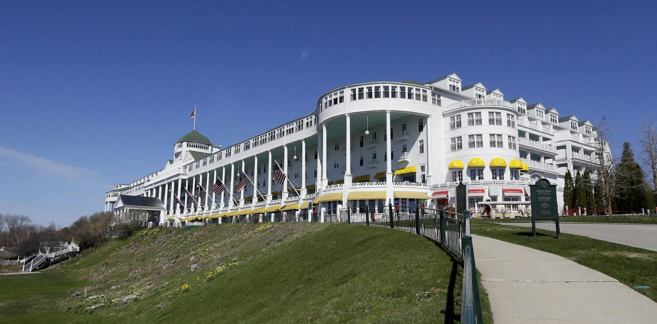 FILE - In this Wednesday, May 6, 2015 file photo, The Grand Hotel on Mackinac Island, Mich., is seen in a photo. The owners of the iconic Grand Hotel on Michigan's Mackinac Island say they've reached a tentative deal to sell the hotel to a private equity firm. (AP Photo/Carlos Osorio, File)