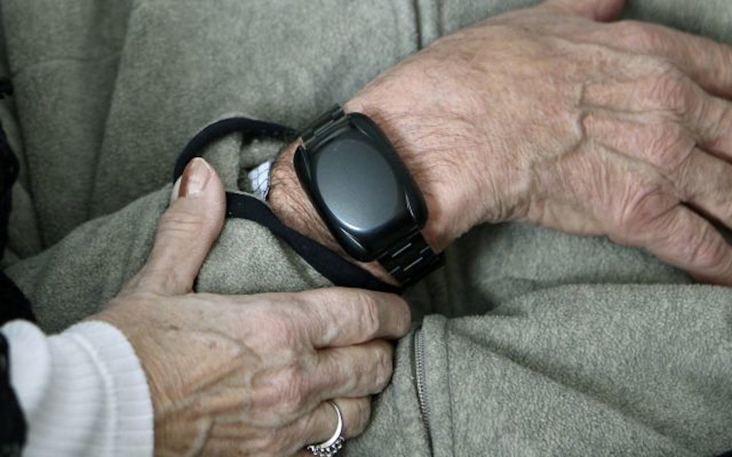 Rod Tietz's mother Joann Tietz held her husband wearing the EM Finder around his wrist.