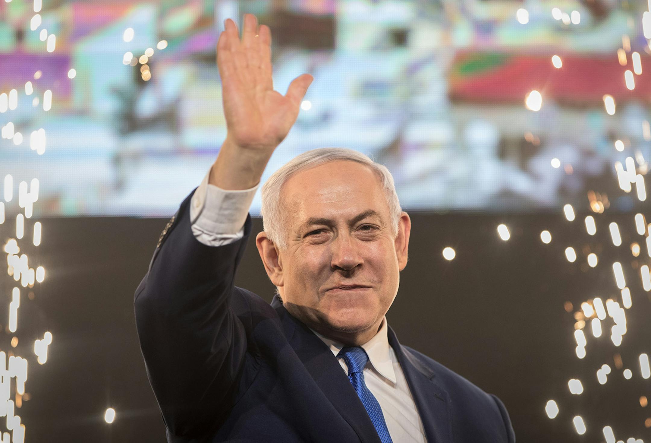 10 April 2019, Israel, Tel Aviv: Benjamin Netanyahu, Prime Minister of Israel, beckons supporters after the polling stations have been closed on April 10, 2019 in Tel Aviv, Israel. Several hours after the closure of the polling stations in Israel, only partial results were available on the night of Wednesday. However, these did not allow any reliable conclusions to be drawn about the final result. (Oliver Weiken/DPA via ZUMA Press/TNS) ORG XMIT: 1299480